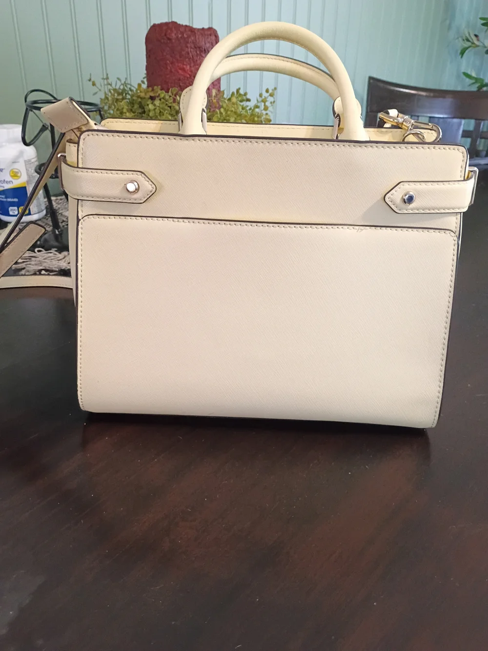 Kate Spade Staci Medium Satchel in a light yellow colorway.